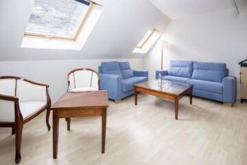 Chambre Junior Suite coin salon avec canap convertible en lit  -  Hotel Fenix Andorre